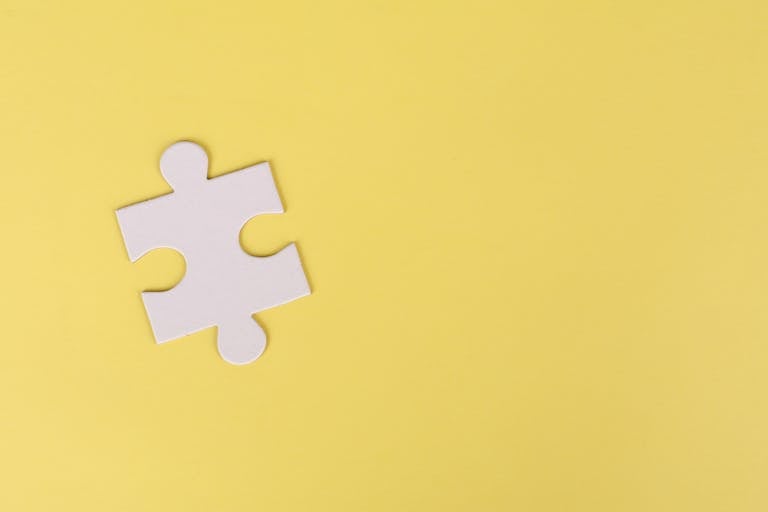 Jigsaw Puzzle on Yellow Background